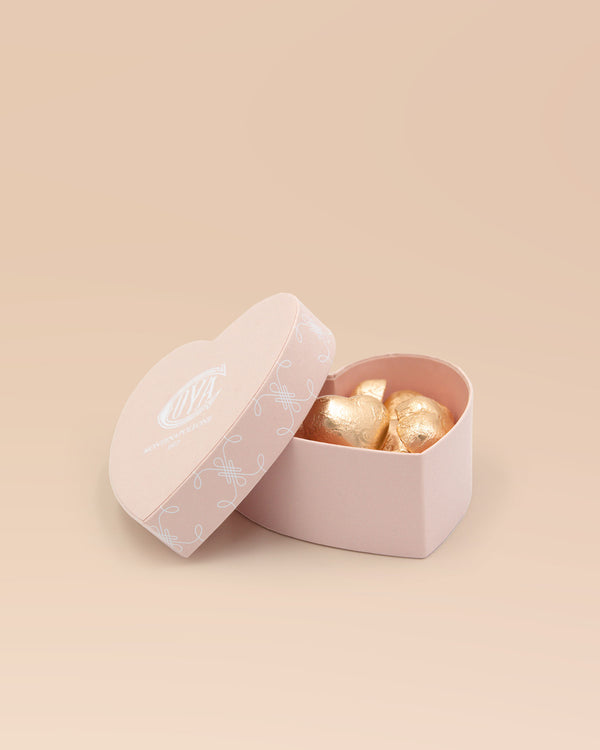 Scatola a cuore rosa con cuori gianduia